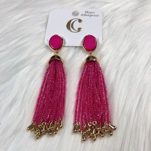 New fashion earrings. Dangle. Pink in color